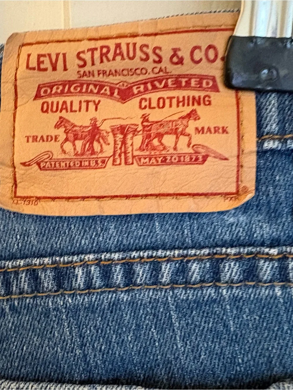 Levis 550 Relaxed Denim Jorts From the 2000s Medium Wash Coastal Mom Shorts